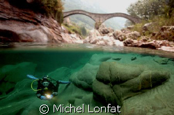 Beautiful dives in the great waters of the Verzasca River. by Michel Lonfat 